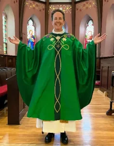 Rich green chasuble with lilies and grape details