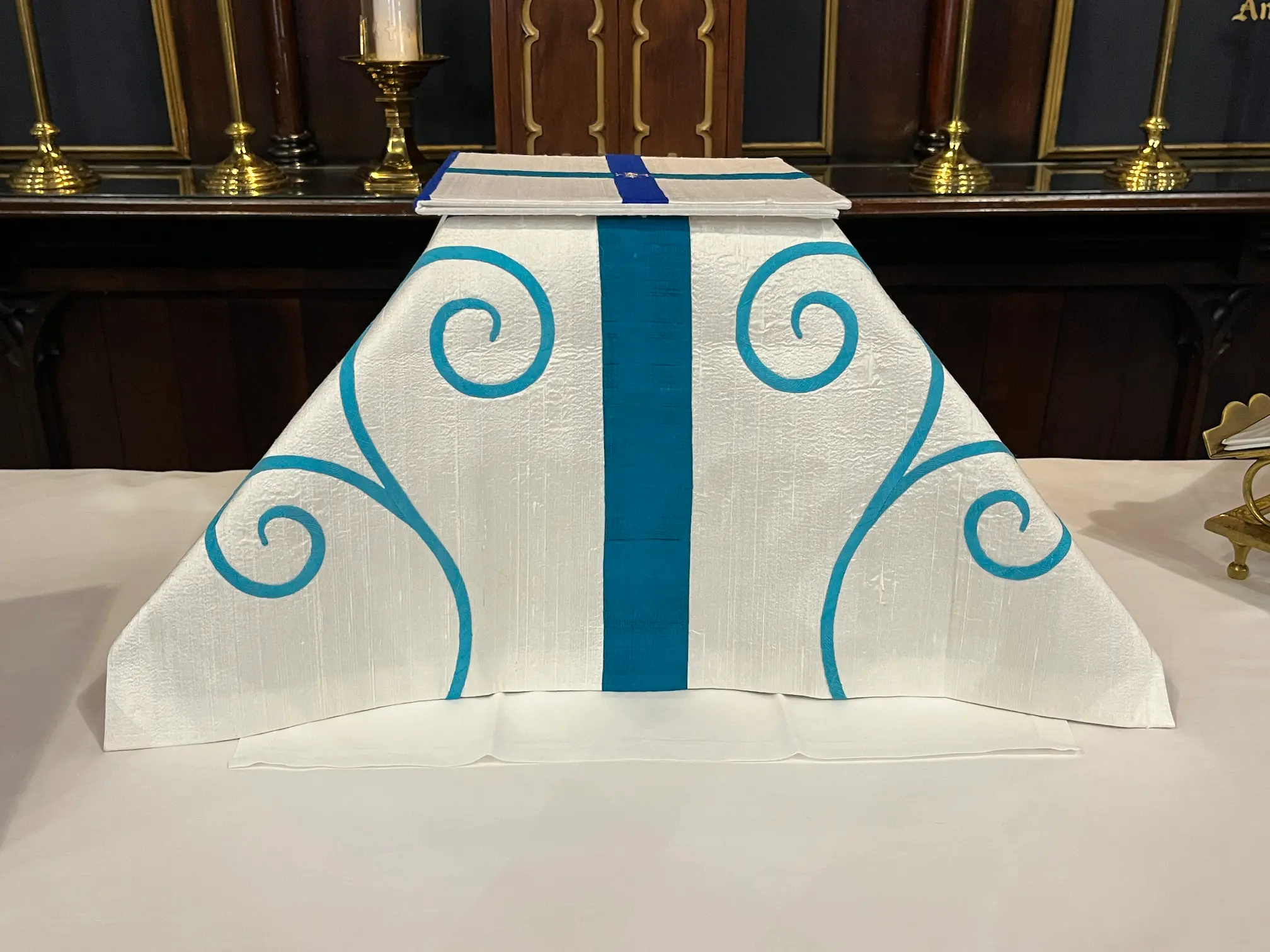 Eucharistic veil and burse at St. James, iwth elaborate scrolls hand appliqued.