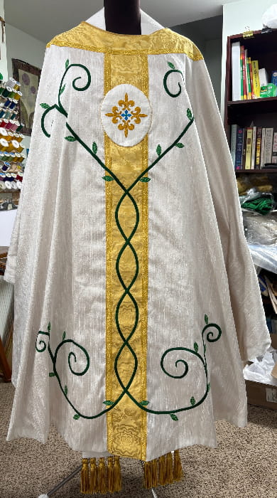 bespoke chasuble with hand-appliqued scroll motif that matches the paraments at this church in Lynn, MA