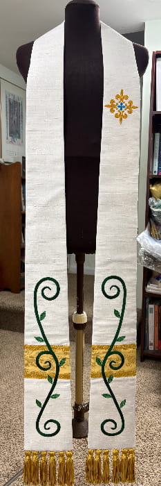 custom clergy stole with hand-appliqued scroll motif that matches the paraments at this church in Lynn, MA