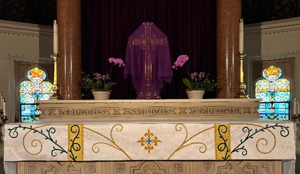 altar front with vines and swirls designed for St. Stephen's in Lynn, MA