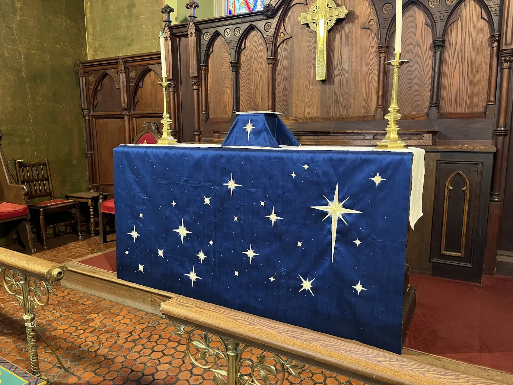 View of the chancel with custom altar paraments in dark blue with stars