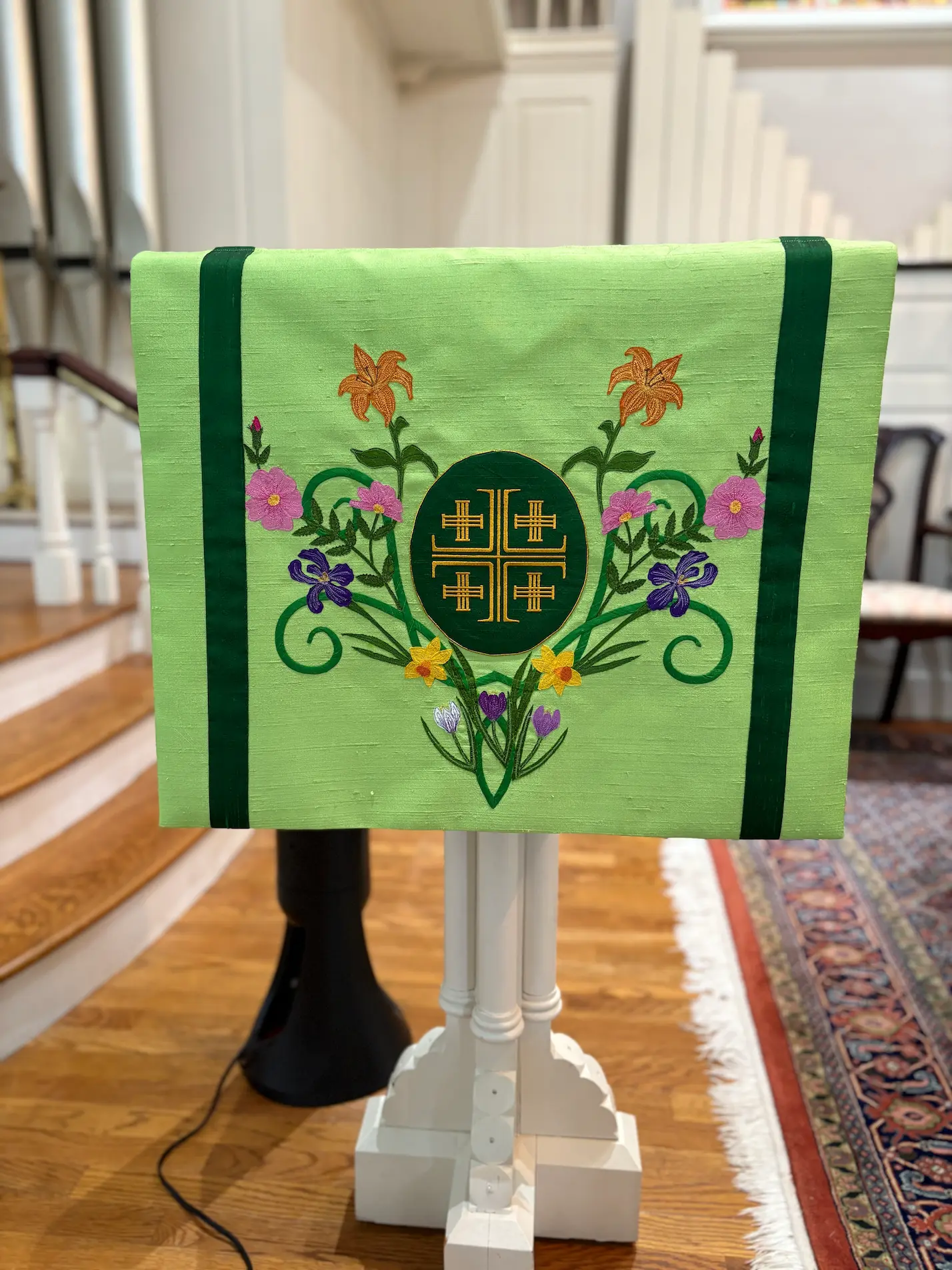 custom pulpit fall with flowers that coordinate with the rest of the paraments and vestments