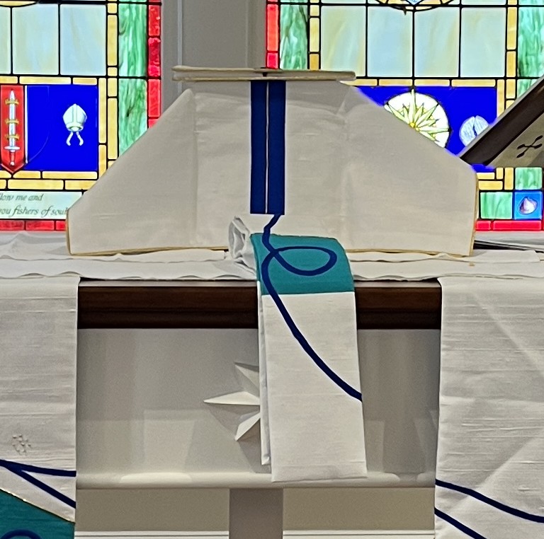 altar frontal with blue scroll bias applique