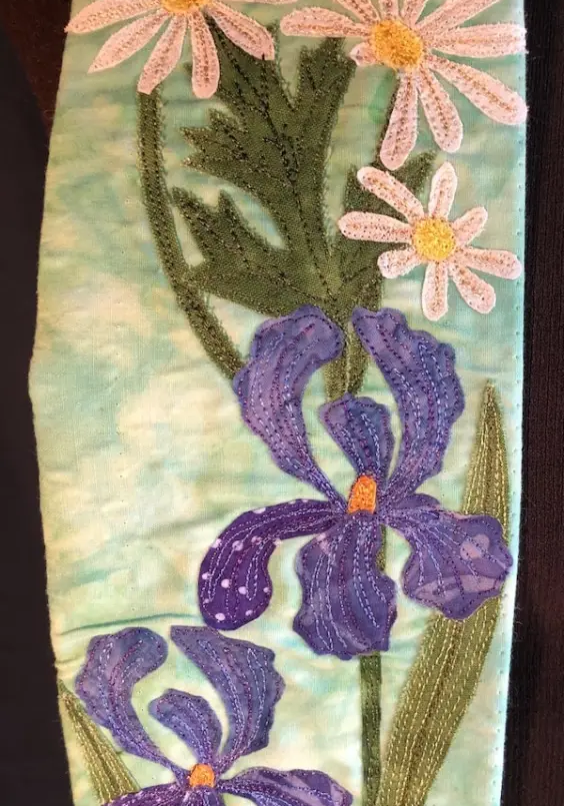 embroidered iris flower detail on liturgical textile