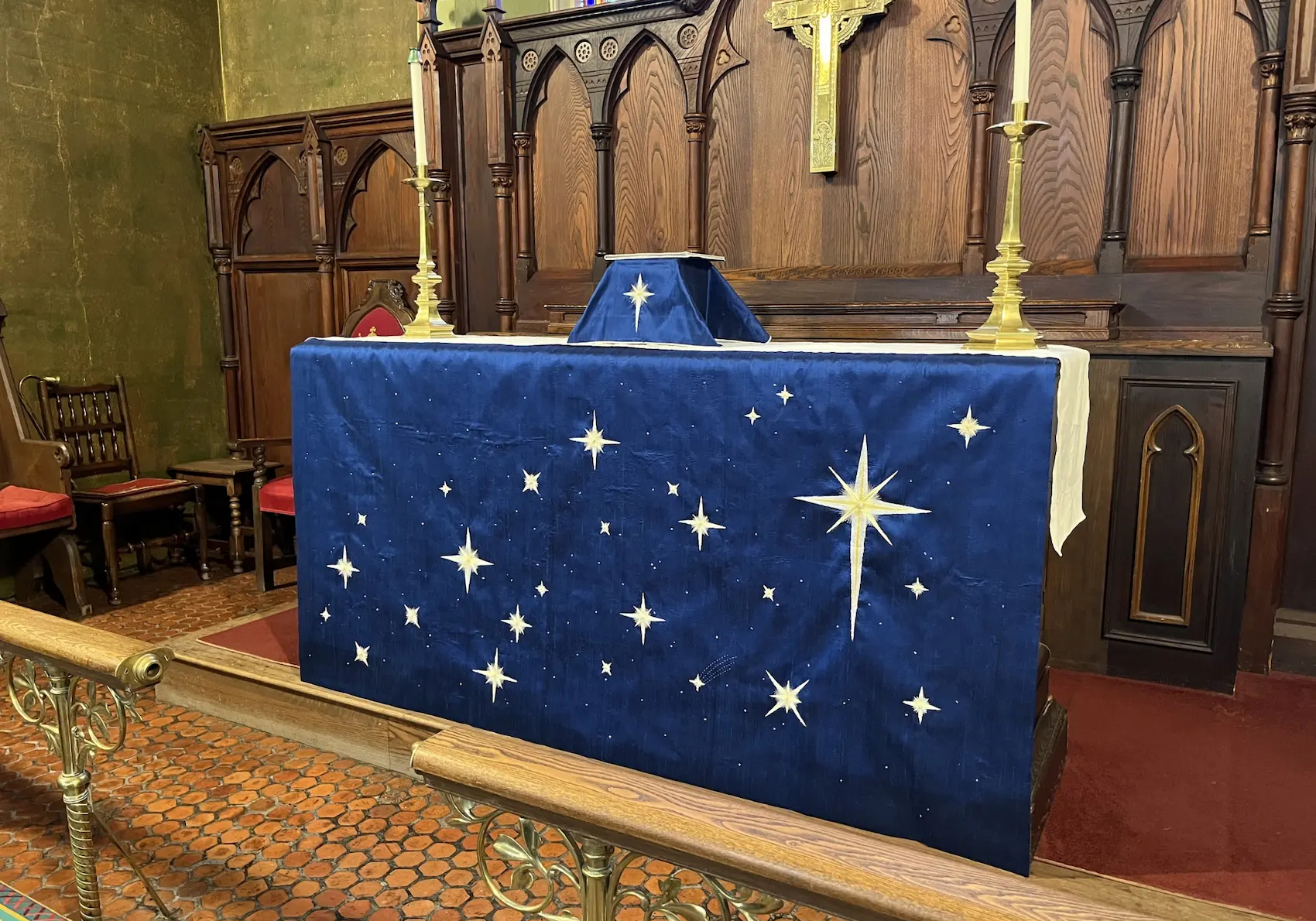 View of the chancel with custom altar paraments in dark blue with stars