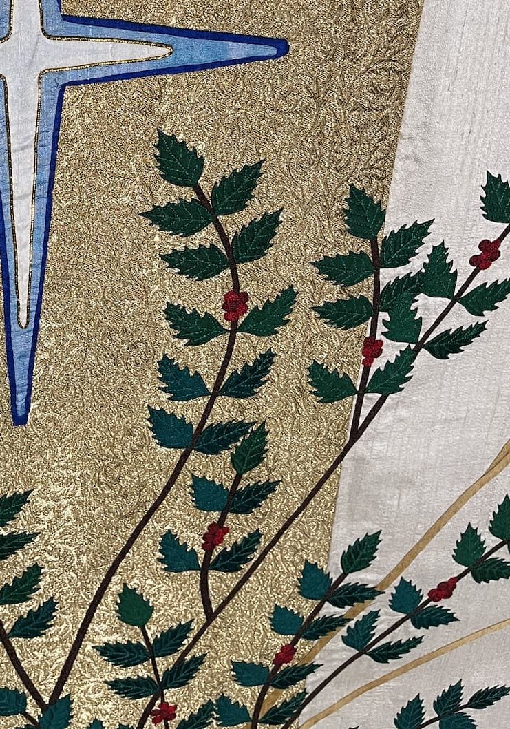 detail of applique and thread painting detail of Christmas altar cloth