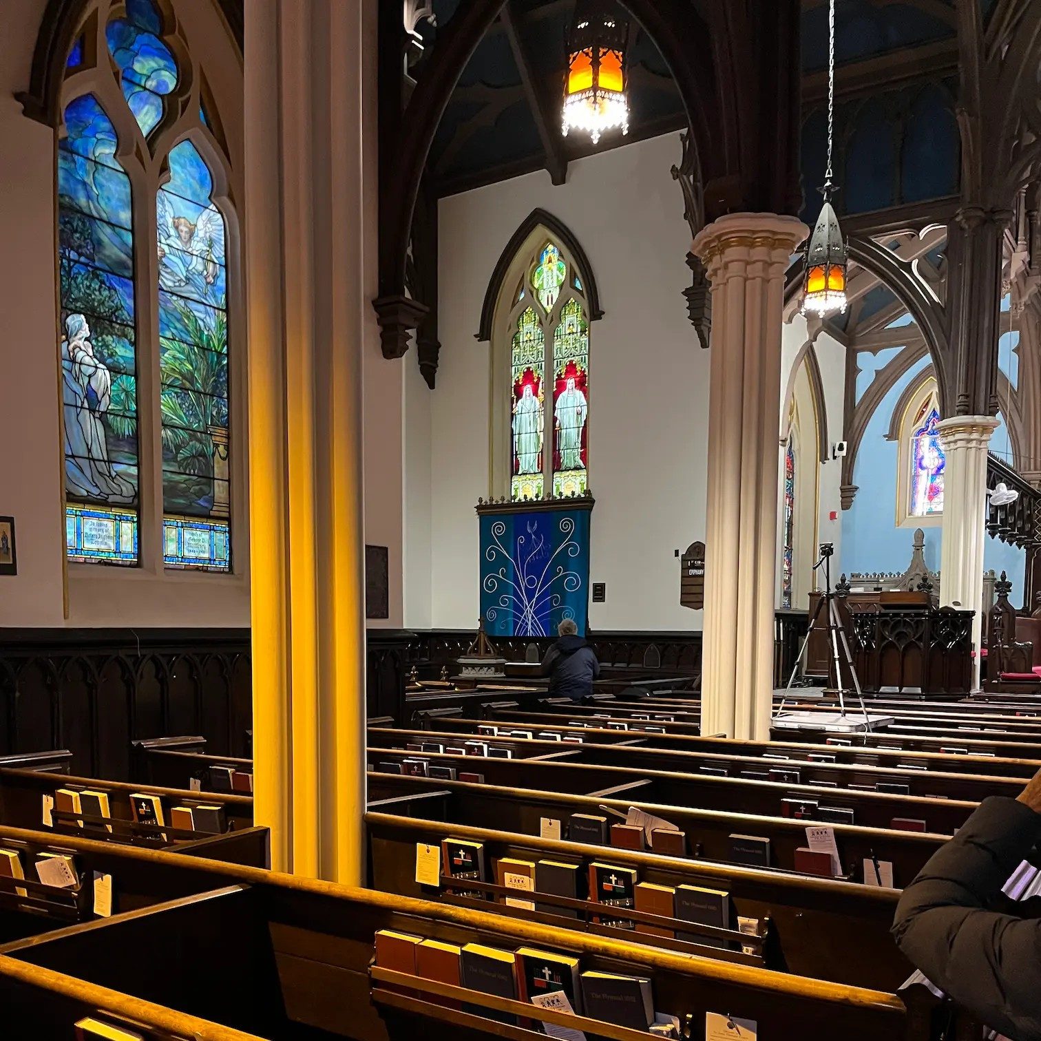 The sanctuary at St. James in New London Connecticut. This photo highlights the dossal and the stained glass windows that inspired the color and design