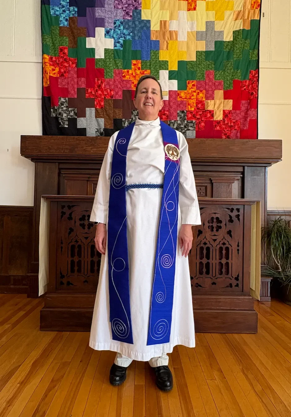 handmade clergy stole with liturgical design inspired by the window colors